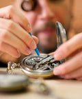 Person repairing watch using 100 Pcs Watch Battery Clamp Screws Replacement Micro Screws Kit for watch repair and jewelry tool set.