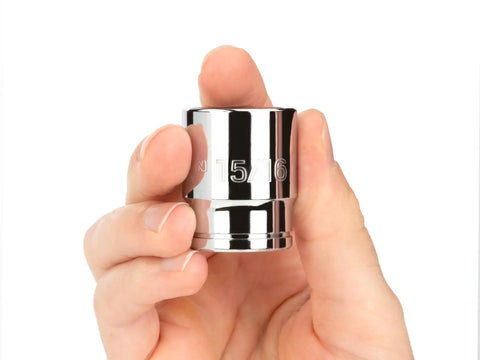 Hand holding 1/2 Inch Drive Shallow 12 Point Socket, 19 Piece, Fits 3/8 To 1-1/2 Inch Bolts, Narrow Profile For Tight Spaces, Built Tough