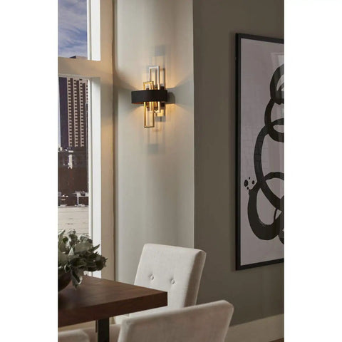 Adagio Collection 2 Light Black Modern Wall Light With Geometric Interlocking Elements in a stylish living room setting
