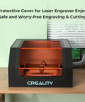 Creality laser engraver enclosure; black plastic housing with orange interior, front view, fireproof and dustproof.