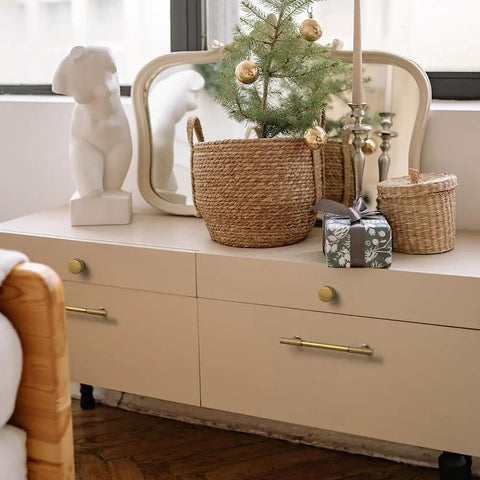Hella Cool Vintage Antique Brass Cabinet Knobs With Classic Striped Groove Top Shelf on a beige drawer unit with decor.