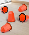 Top Tier 13 Piece Magnetic Fire Sprinkler Covers For Zero Fuss Temporary Paint Masks Tough PVC Recessed Sprinkler Protectors Cinch Setup DIY home reno, five orange covers on floor.