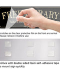 Person peeling protective film from Acrylic 9x3 Inch Free Library Sign Self Stick Door Wall Signage with Royal Black Finish and foam tape.