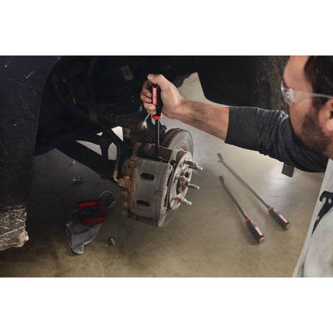 Man using utility pry bar set with 12, 18, and 24 inch lengths, heavy duty demo tools for car maintenance, bi material grip, black and red finish