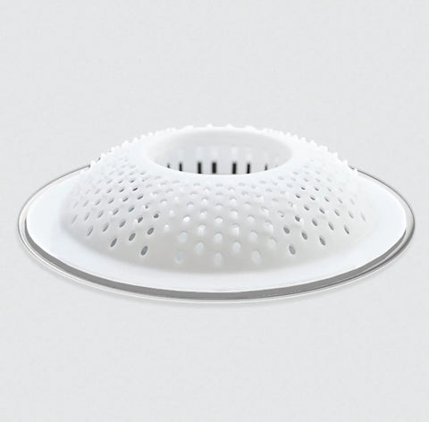 White drain cover hair catcher for shower and bathtub 3 pack that keeps hair out and prevents clogs while letting water flow freely.