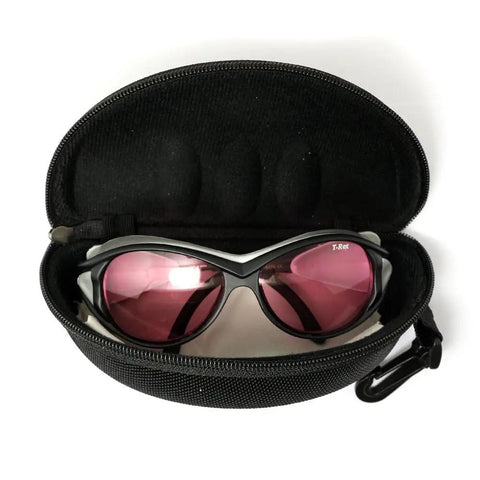 Kickass Protective Laser Safety Goggles For 808 NM Infrared Diode Lasers in a protective case with pink lenses.
