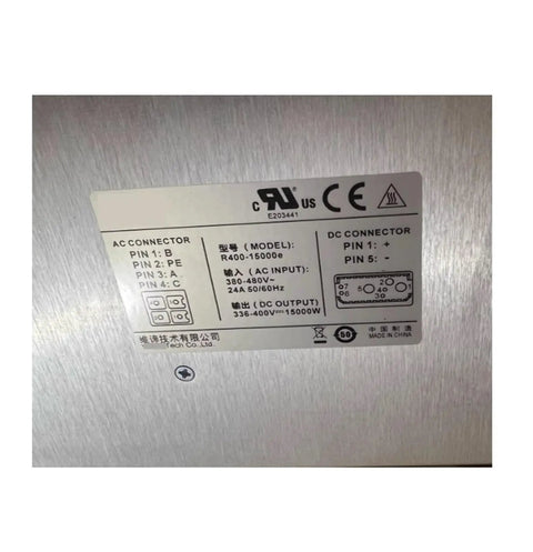 Label detail of R400 15000e Rectifier Power Module Switching Supply with AC and DC connection specifications.