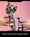 Astro Boy Mechanical Building Set With Clear Version Licensed Classic Anime Figure held by hands on pink background.