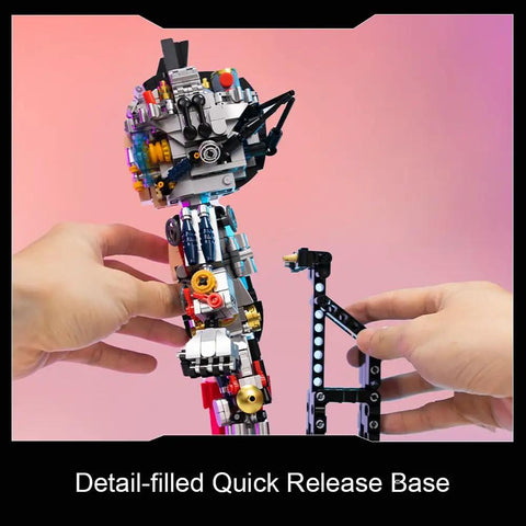 Astro Boy Mechanical Building Set With Clear Version Licensed Classic Anime Figure held by hands on pink background.