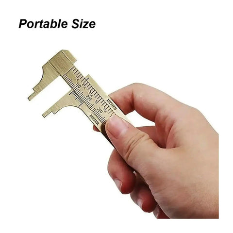 Solid Brass Digital Caliper High-Precision Mini Tool Crafts Jewelry held in hand, portable size for easy measurement.