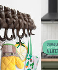 Hella Tough Cast Iron Wall Hook Rack With Seven Cute Cat Designs For Coats Keys And Hats, Vintage Rustic Brown organizer with mitts.