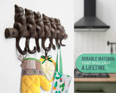Hella Tough Cast Iron Wall Hook Rack With Seven Cute Cat Designs For Coats Keys And Hats, Vintage Rustic Brown organizer with mitts.