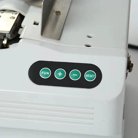 Control panel of Compact Automatic Paper Strapping Machine With Counting Function showing buttons for fun, adjust, and reset.
