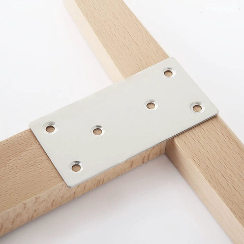 Heavy Duty Stainless Steel Flat Brackets 30 Pack 4 By 2 Inch Mending Plates For Furniture Wood Shelf Repair mounted on wood.