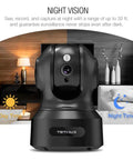 Indoor Wireless Security Camera 1080P With Alexa showcasing night vision capability in a living room setting.