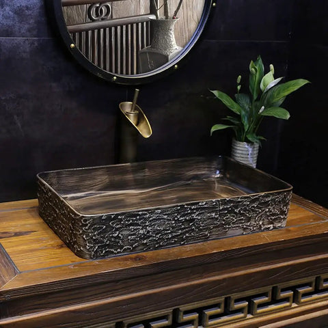 USZWBY Vessel Sinks Bathroom Vanity Sink Rectangular Ceramic Washbasin Art Countertop Basin on wooden surface with round mirror.