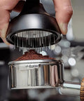 Upgrade Your Daily Brew Routine With This Dope Adjustable Espresso Coffee Tamper And Premium Needle Distributor Leveler Compatible With Most 58Mm Portafilters. Adjustable needle distributor over ground coffee.