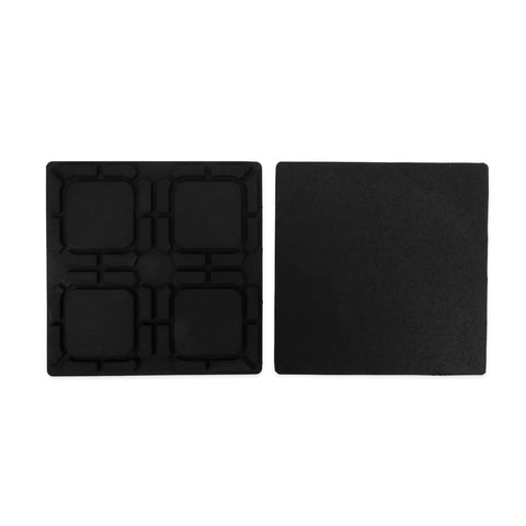 Universal RV Flex Leveling Pads Support For Jacks And Stabilizers Anti Sink Design Keeps Your Camper Solid On Soft Dirt Or Grass Setup Makes Leveling A Sweet Breeze With Eight Point Five Inch Square Base showing two black leveling pads.