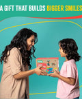 Child receiving Candy Dispenser Woodworking Kit For Kids A Hands On STEM Building Project With FSC Certified Wood Paints And Tools Includes DIY Gumball Machine Craft For Boys And Girls Ages Six And Up kit.