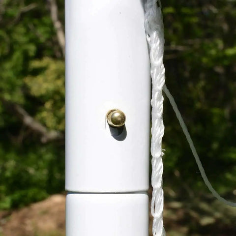 Close-up of snap-together pole of Easy Set Soccer Goal 6 Foot By 4 Foot Portable Backyard Frame With No Tools Needed Rust Resistant Steel Construction Snap Together Poles And Self Stick Net Straps For Quick Setup For Practice And Games.