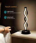 Set Of 2 Black Dimmable LED Bedside Lamps With Infinity Spiral Design, touch control on nightstand, living room or bedroom use.