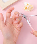 Using the 4 In 1 Cuticle Tool Set With Nipper Pusher Cutter And File In Pink Leather Case For Pro Grade Nail Care