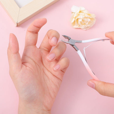 Using the 4 In 1 Cuticle Tool Set With Nipper Pusher Cutter And File In Pink Leather Case For Pro Grade Nail Care