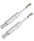 Heavy Duty Pair Of Four Inch Five Pound Gas Spring Lift Supports With Solid Carbon Steel Build Universal For Rv Car Truck Boat Hoods And Tailgates showing two silver struts side by side.