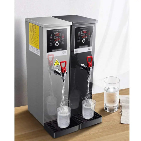 Heavy Hitting Commercial Step Water Heater With Triple Layer Insulation Offers Rock Solid Heat Lock And Instant Continuous Flow Hot Water on display with dual taps.