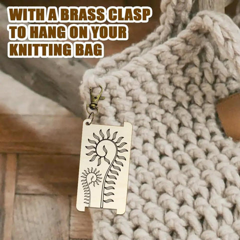 Wooden Yarn Wrap Guide Board With Clasp WPI Gauge hanging on crochet bag, spiral leaves design for spinners and crafting.