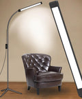 Led Floor Lamp For Eyelash Extensions And Makeup Standing Light next to a dark brown leather armchair