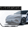 Keep Your Ride Plugged Up And Protected With This Waterproof Charging Port Cover Featuring A Super Strong Suction Cup Seal For Total Weatherproof Coverage Anytime You Hit The Road, showing a clear port cover and modern EV.