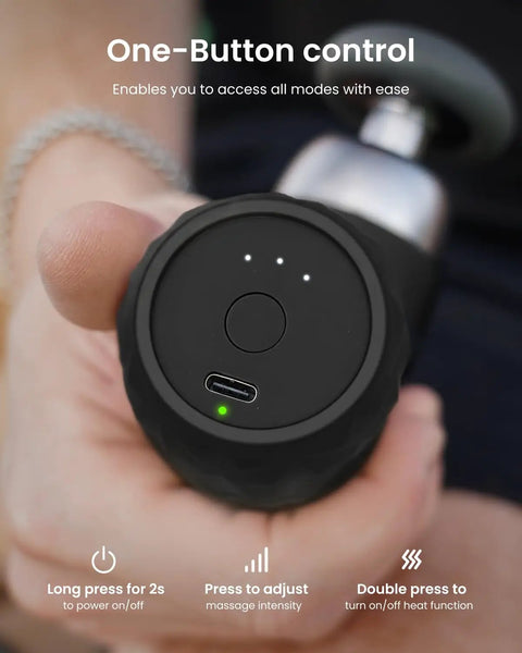 Close-up of Mini Thermal Massage Gun With Heat Portable Deep Tissue Percussion Massager With Four Heads showing control button.