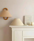 Wall Sconce Lights Indoor Bedroom Hallway Modern Fabric,Wood Ring E14 Lamp for mounted on wall with beige shade and wood ring.
