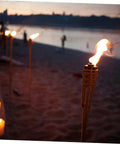 Two Pack Outdoor Tiki Torch Lights for Pathway Lighting, Refillable Garden Oil Torches, beach setting, evening ambiance