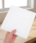 Straight Up White Abs Access Panel Cover For Ceiling Maintenance And No Sweat Pipe Concealing Universal Drywall Patch Seamless Drain Tube Shield Smooth Indoor Plumbing Solution held in hand.
