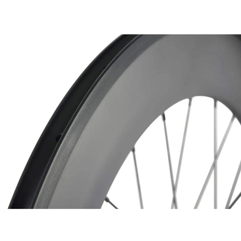Close-up of Carbon Wheelset 38/50/60/88mm 700c Clincher 23mm UD Matte Finish For Road Bikes With Basalt Brake Surface Shimano