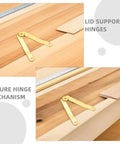 Golden Iron Lid Support Hinges with Smooth Opening on wooden surface