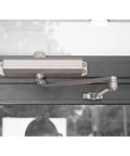 Compact Workhorse Door Closer With Adjustable Spring Tension And Aluminum Finish ADA Ready Non Handed Reversible on door