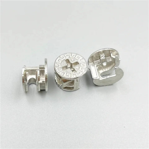 Heavy Duty Cam Lock Fittings Kit Featuring Solid Cam Nuts And Eccentric Bolts For Furniture Assembly and Cabinet Joinery Rust Proof Hardware showing three metal cam nuts.