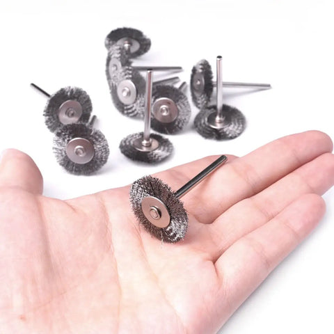 Hand holding 20 Pack Mini 1 Inch Wire Wheel Brushes With 1/8 Inch Round Shanks For Drill Attachments, Crimped Wire Wheel Set