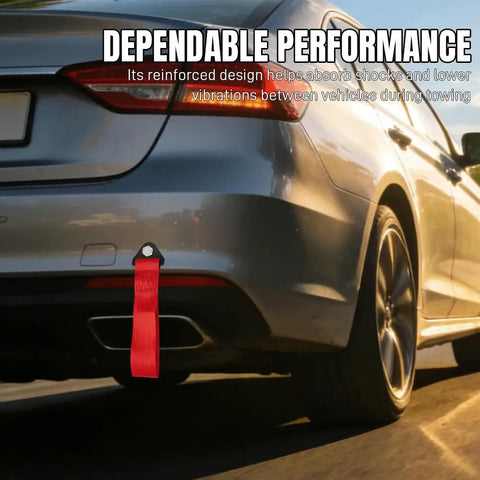 Heavy Duty Racing Tow Strap With Thick Nylon Towing Rope And Secure Hooks, Badass 2 Ton Pulling Power For Smooth Emergency Vehicle Recovery And Rear Bumper Mount In Vibrant Red, mounted on car bumper.
