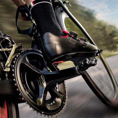 Cyclist using Dual Sensing Pedal Based Power Meter With Extra Cleats For Road Cycling, Easy To Move Between Bikes, Bluetooth