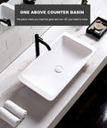 Slick Polished Artificial Stone Countertop Bathroom Sink With Integrated Drain Heavy Duty Oval Art Basin For Modern Vanity Cabinet Zero Hassle Scratch Proof Finish above counter view with black faucet and towels.