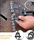 Heavy Duty Motorcycle Chain Tensioner Tool Large Steel Multifunctional Bike Chain Tightener being used on motorcycle chain.