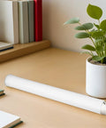 Extendable Plastic Mailing Tubes With Sealed Caps 4 Pack For Poster Artwork And Document Storage on desk with plant