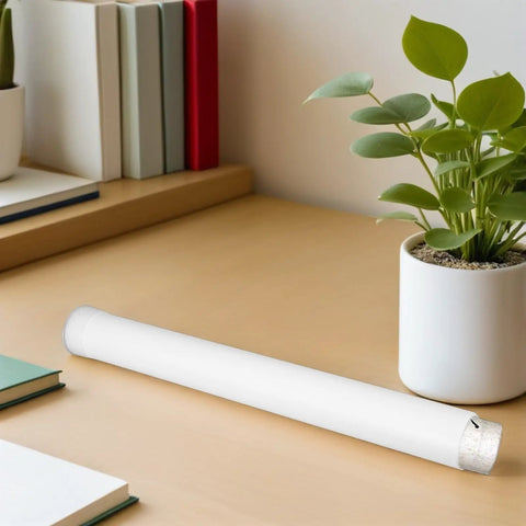 Extendable Plastic Mailing Tubes With Sealed Caps 4 Pack For Poster Artwork And Document Storage on desk with plant