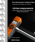 Dope Little Fiber Optic Power Meter And Cable Tester With Nine Calibrated Wavelengths and USB flash charging on dark surface