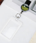 Heavy Duty Metal Badge Reel With 360 Degree Swivel And Secure Belt Clip, stainless steel retractable ID holder on surface.