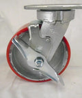 Rolls Like A Dream Six Inch Swivel Caster With Secure Locking Brake Kingpinless Design showing red polyurethane tire and metal mount.